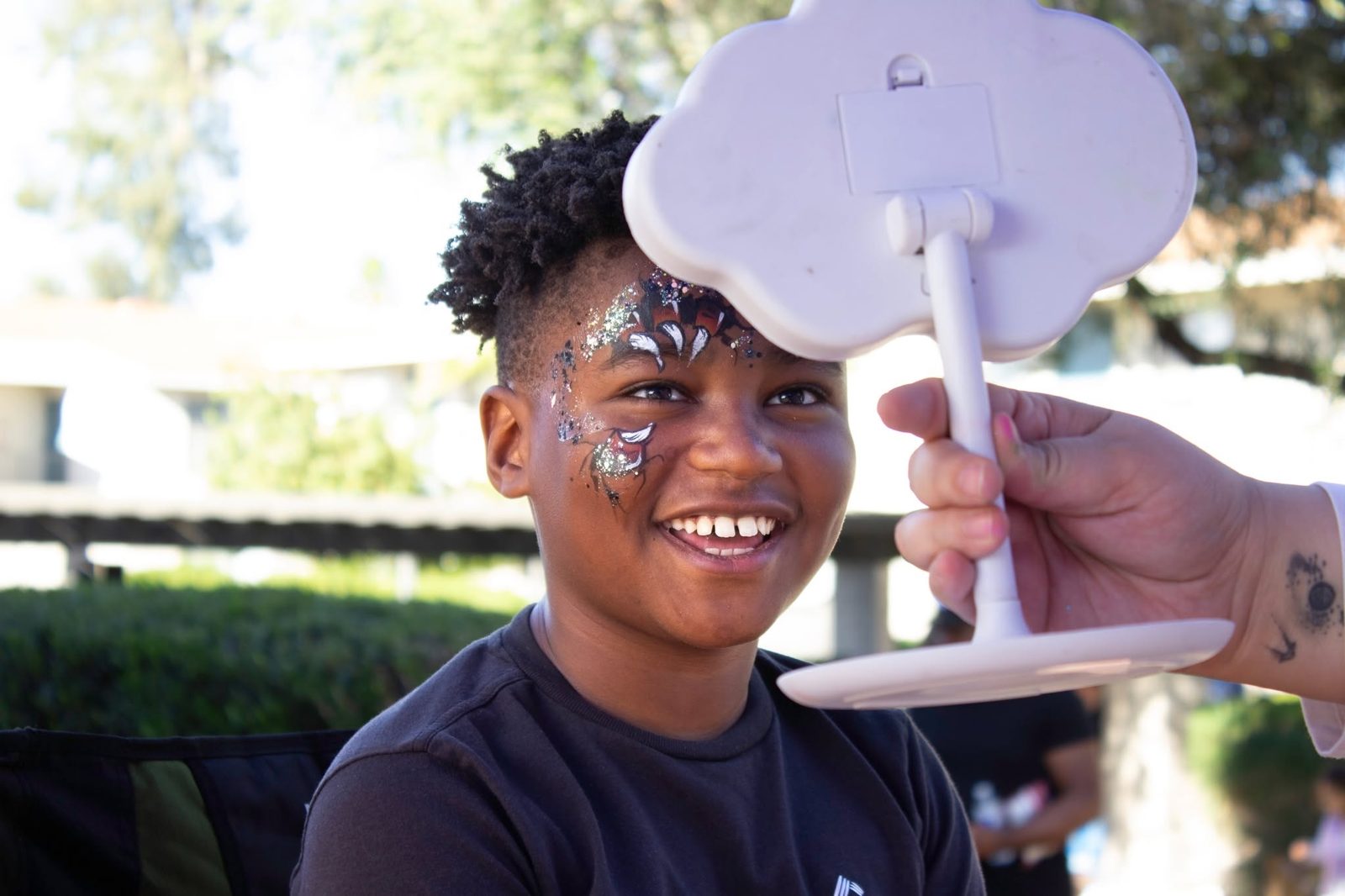 Superhero claw marks face paint design