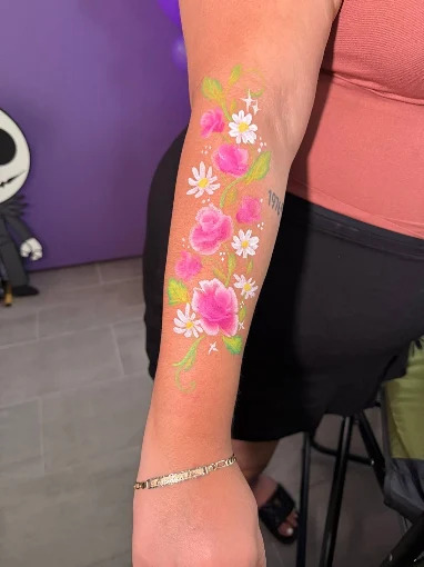 Bright flower and butterfly arm painting